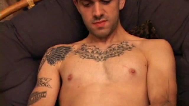 Tattooed Jesse is happy to jack off wherever and whenever he pleases. Lucky for us, we're there for the show. He tugs at his hardening cock, while sitting in a chair, before he stands up and defies gravity for a while.