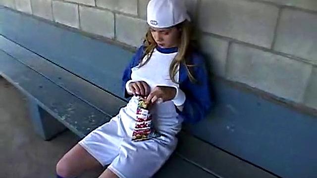 Little April Plays With Herself After A Game Of Baseball