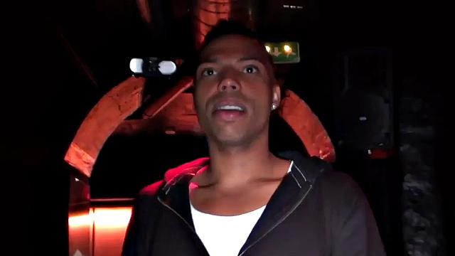 Blindfolded stud in cage fucks Black in gay club