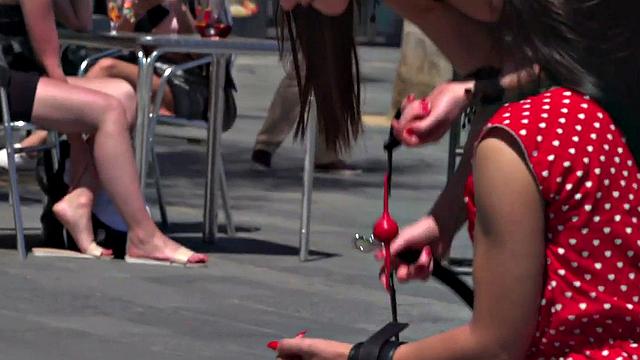 Kinky tattooed brunette sub gagged and humiliated by her domme in public