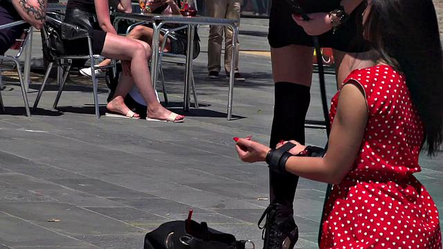 Kinky tattooed brunette sub gagged and humiliated by her domme in public