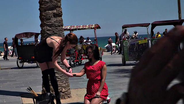 Kinky tattooed brunette sub gagged and humiliated by her domme in public