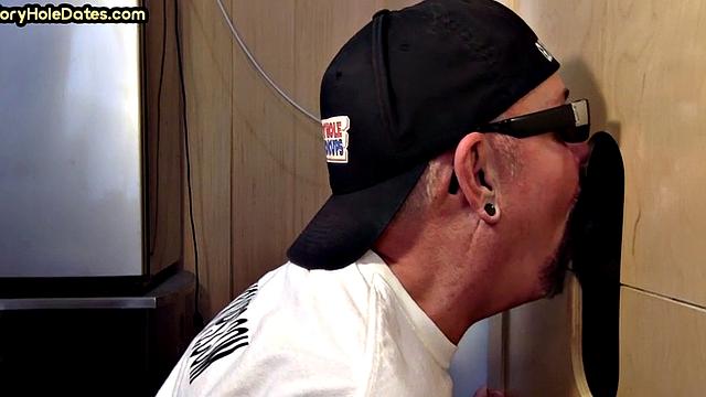 Gloryhole DILF sucks black penis with greedy mouth