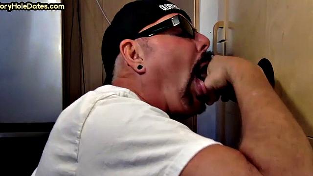 Gloryhole DILF sucks black penis with greedy mouth