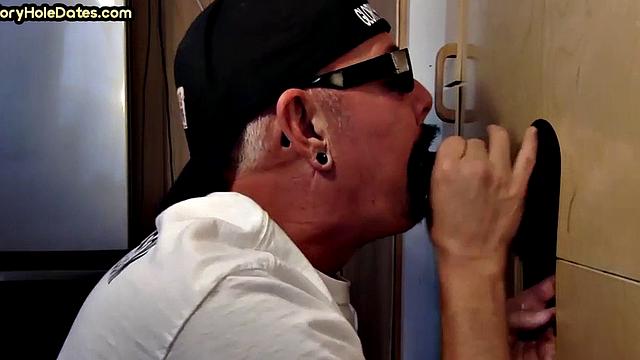 Gloryhole DILF sucks black penis with greedy mouth