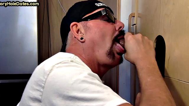 Gloryhole DILF sucks black penis with greedy mouth