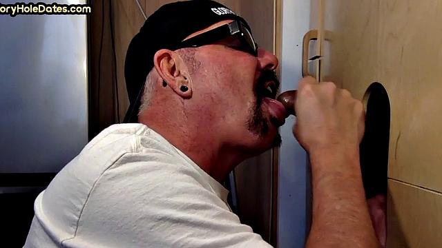 Gloryhole DILF sucks black penis with greedy mouth