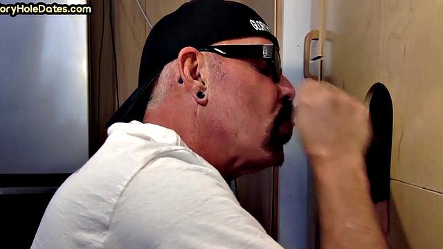 Gloryhole DILF sucks black penis with greedy mouth