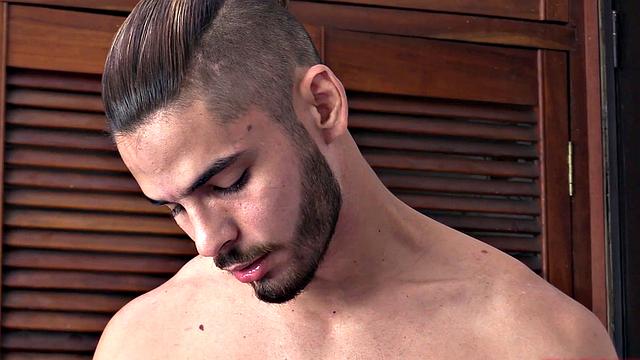 Gus drops to his knees to give Daguy a blowjob, and by the time they are naked he's bent over and taking that stiff cock up his Latin ass. Daguy pauses to lick his bottom's ass and then takes Gus' legs in the air.