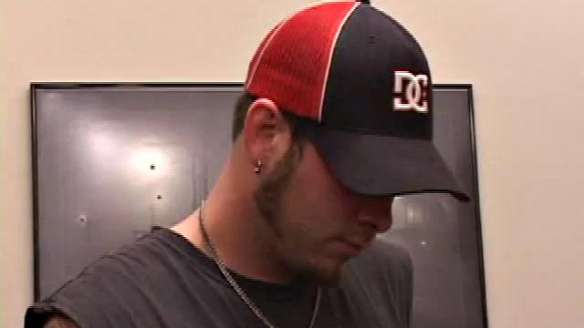 Pierced punk Elijah Mageddon goes to work on his cock. After stroking his stiff dick to the porn video, he pumps out his warm cum load onto the skateboard.