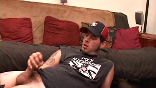 Pierced punk Elijah Mageddon goes to work on his cock. After stroking his stiff dick to the porn video, he pumps out his warm cum load onto the skateboard.