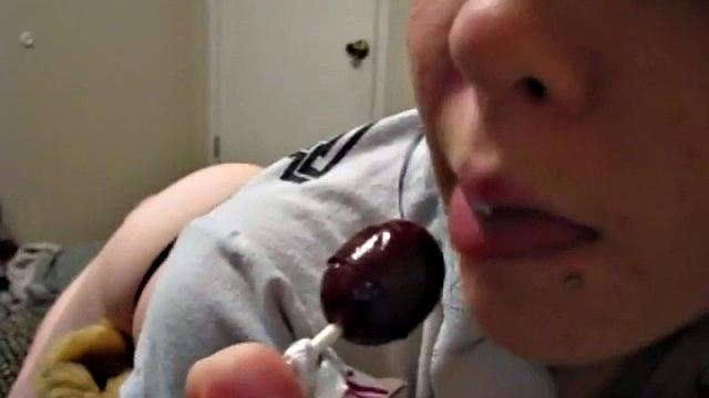 Sexy teen half naked sucking on a lollipop