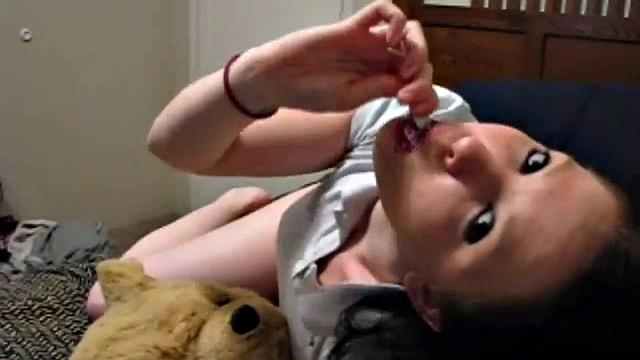 Sexy teen half naked sucking on a lollipop