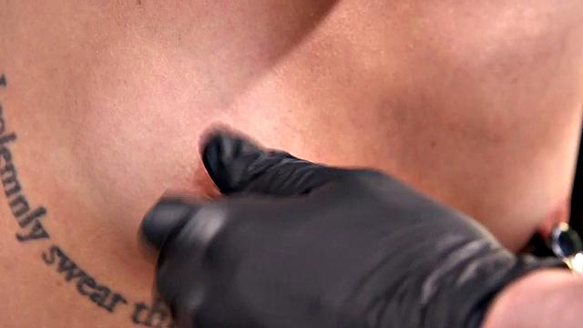 Bound submissive clamped and gagged by her domme