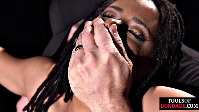 Bound black submissive fingered by her strict dom