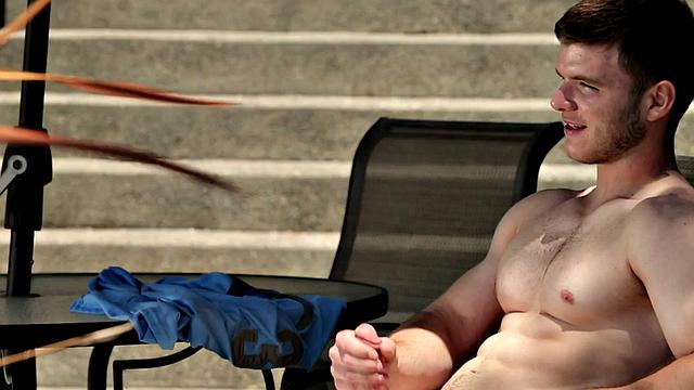 Hunky newbie stroking his dick in outdoor action