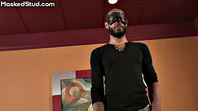 Masked muscled man gets blowjob