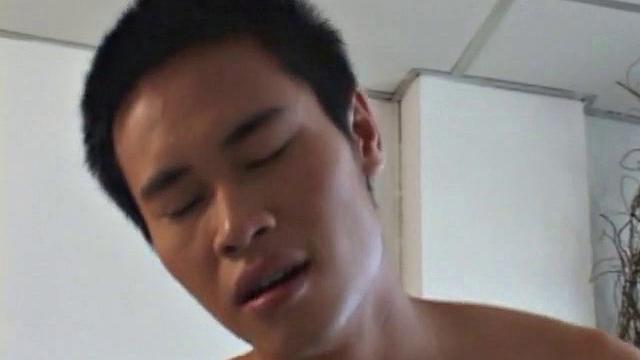 Asian boys Moo and Eak find unlocked storeroom. Eak strips down and sits in chair, while Moo latches onto his big fat cock, an oral exchange follows, until both boys cum
