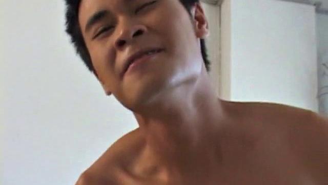 Asian boys Moo and Eak find unlocked storeroom. Eak strips down and sits in chair, while Moo latches onto his big fat cock, an oral exchange follows, until both boys cum