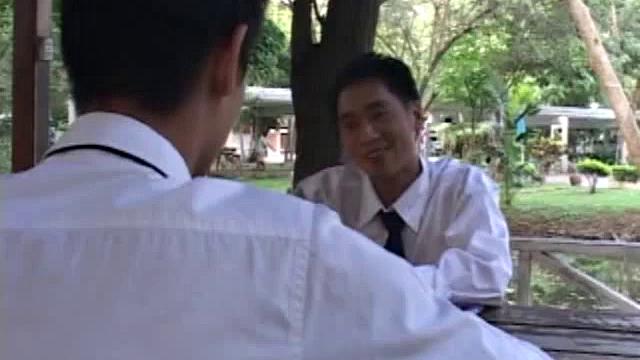 Asian boys Moo and Eak find unlocked storeroom. Eak strips down and sits in chair, while Moo latches onto his big fat cock, an oral exchange follows, until both boys cum