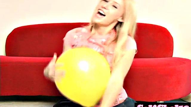 Sexy blonde Allie bounces topless on balloon in POV