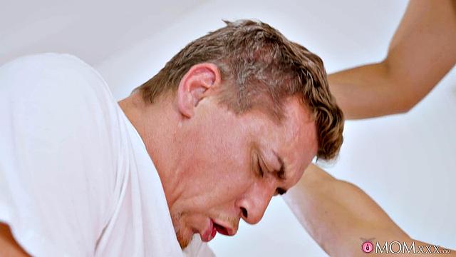 Horny MILF in threesome with handymen