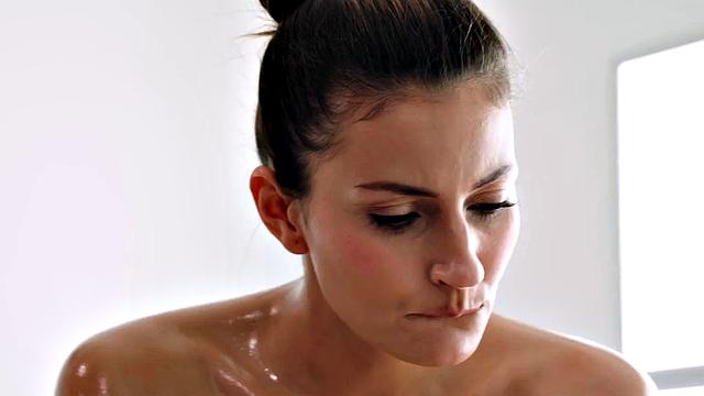 Oiled babe passionately fucked on massage table