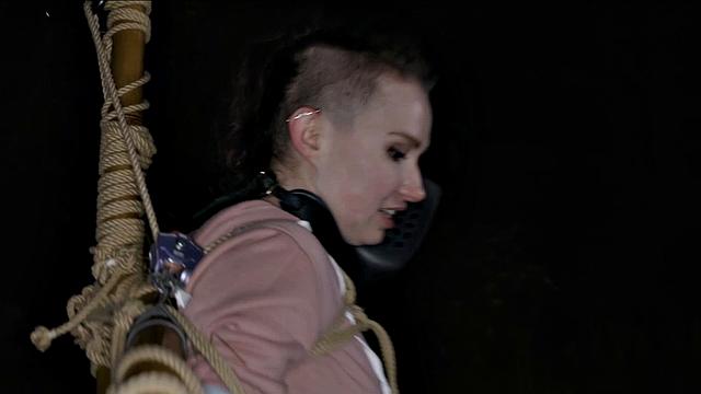 Petite sub put into bondage on a cool night before sucking cock