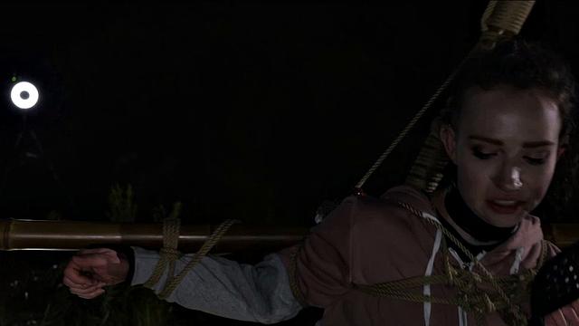 Petite sub put into bondage on a cool night before sucking cock