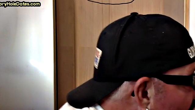 Throating gloryhole DILF eats black cock in closeup