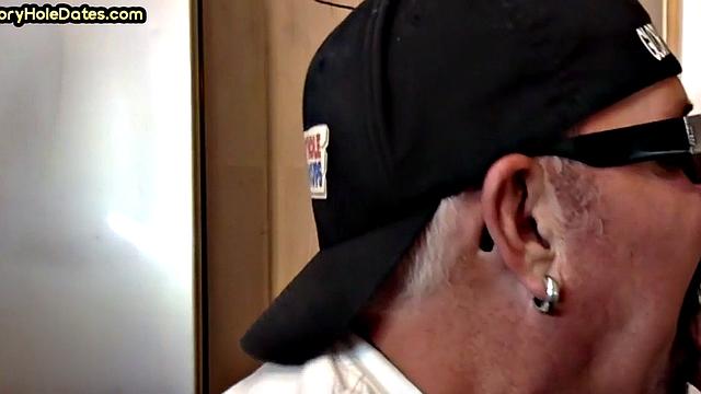 Throating gloryhole DILF eats black cock in closeup