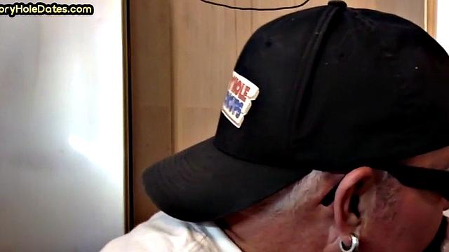 Throating gloryhole DILF eats black cock in closeup