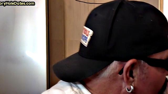 Throating gloryhole DILF eats black cock in closeup