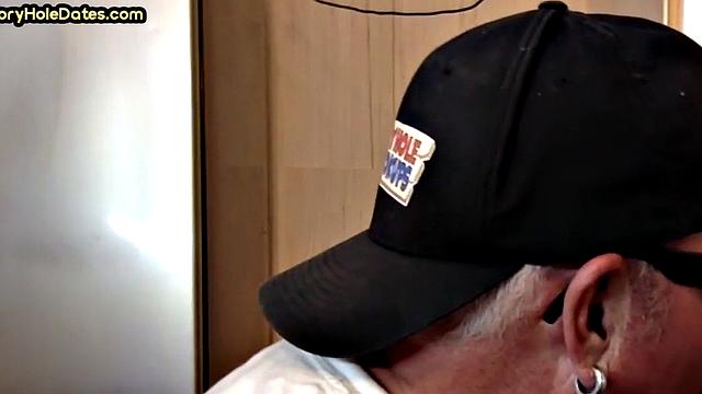 Throating gloryhole DILF eats black cock in closeup