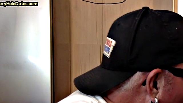 Throating gloryhole DILF eats black cock in closeup