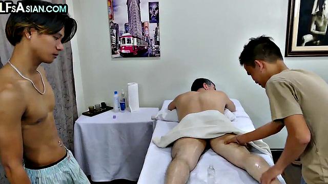 Massaged DILF enjoys barebacking with Asian twinks