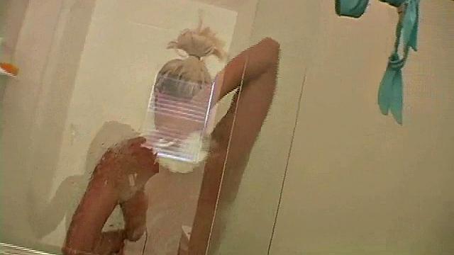 Teasing blonde fondles her pretty titties in POV