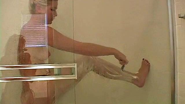 Teasing blonde fondles her pretty titties in POV