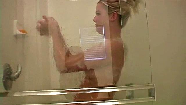 Teasing blonde fondles her pretty titties in POV