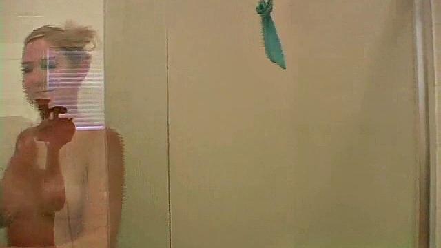 Teasing blonde fondles her pretty titties in POV