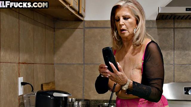 Cockhungry GILF shares cock with ebony babe in kitchen