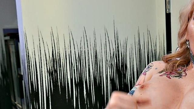 Busty trans beauty tweaks her nipples and tugs cock