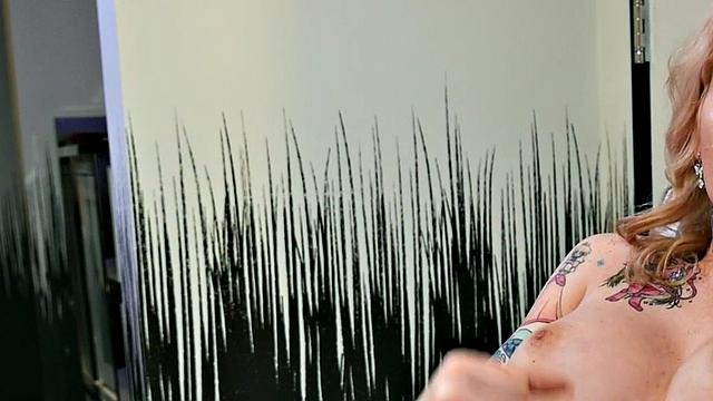 Busty trans beauty tweaks her nipples and tugs cock