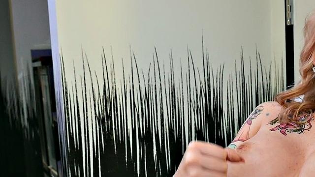 Busty trans beauty tweaks her nipples and tugs cock