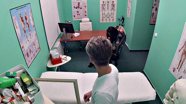 Watch as tattooed doc frees love balls & gives POV handjob in the office