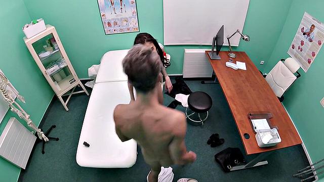 Watch as tattooed doc frees love balls & gives POV handjob in the office