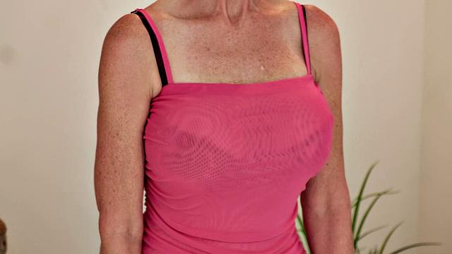 How deep into her pussy can this 60-year-old go?