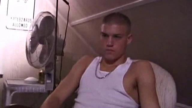 Not content with sitting while he jacks off, Lance teases the neighbors by standing on the roof outside his bedroom window to give everyone a show. Then he finishes by blowing his load onto the floor of his bedroom.