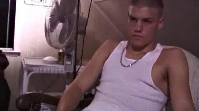 Not content with sitting while he jacks off, Lance teases the neighbors by standing on the roof outside his bedroom window to give everyone a show. Then he finishes by blowing his load onto the floor of his bedroom.