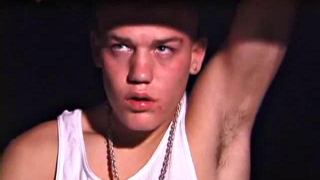 Not content with sitting while he jacks off, Lance teases the neighbors by standing on the roof outside his bedroom window to give everyone a show. Then he finishes by blowing his load onto the floor of his bedroom.